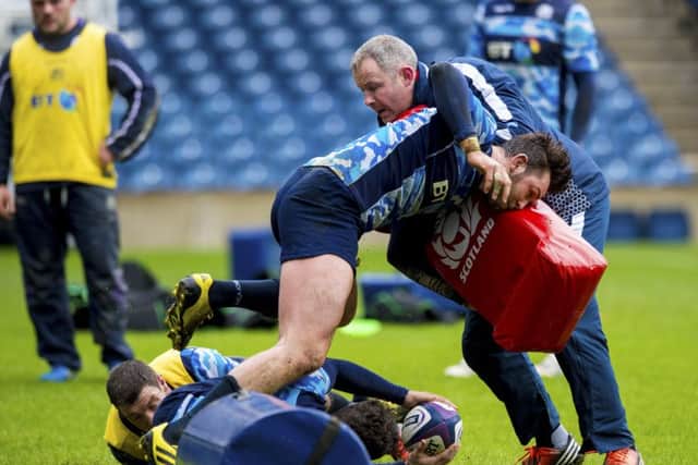 Scotland breakdown coach Richie Gray, right, at tackling practice. Picture: Craig Williamson/SNS/SRU