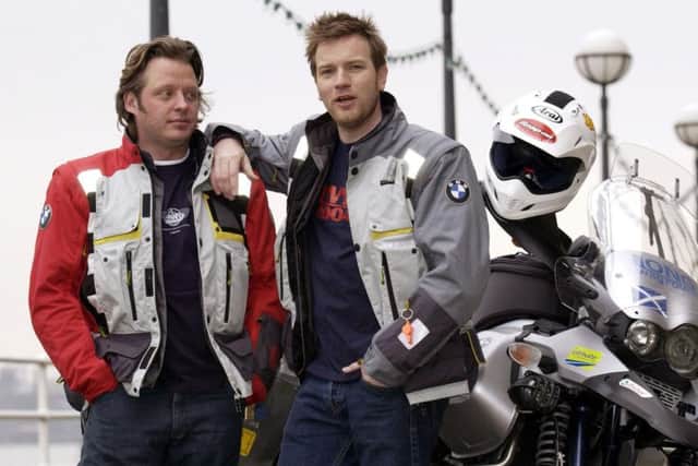 Actor Ewan McGregor  friend Charley Boorman pose for photographers during the launch of their 20,000-mile, three-month transcontinental motorbike adventure from London to New York, entitled 'Long Way Round'. PA Photo: Yui Mok.