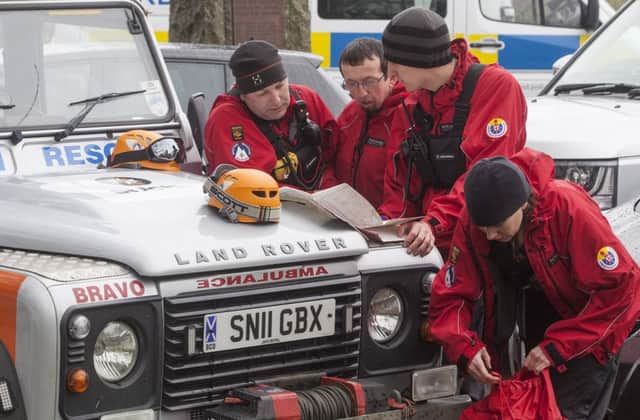 A mountain rescue teams gathers in Durisdeer, north of Thornhill, in Dumfries. Picture: Hemedia
