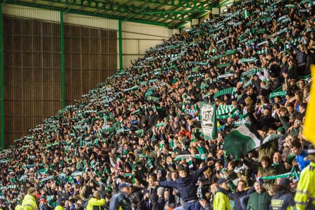 Hibs fans celebrate at full-time. Picture: Ian Georgeson