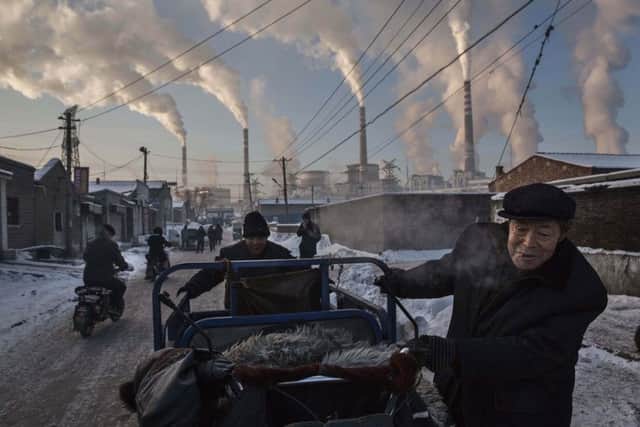 'China's Coal Addiction' by Canadian photographer Kevin Frayer that has won 1st prize in the Daily Life singles category. Picture: PA