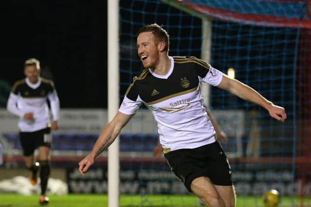 Adam Rooney, with 18 already, is on course to beat the clubs record of 22 league goals in a season. Picture: PA