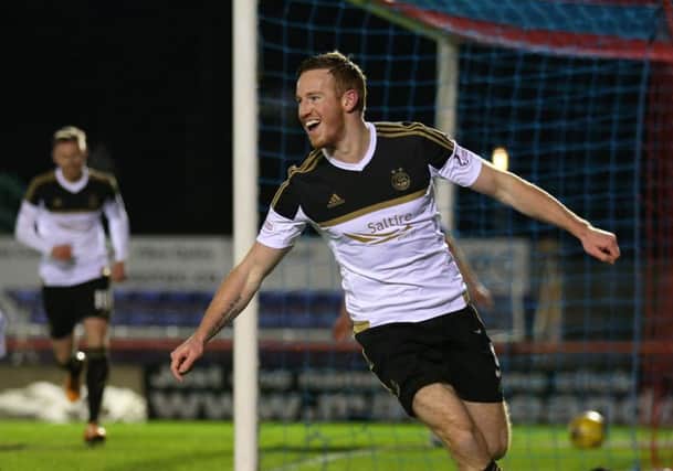 Adam Rooney, with 18 already, is on course to beat the clubs record of 22 league goals in a season. Picture: PA