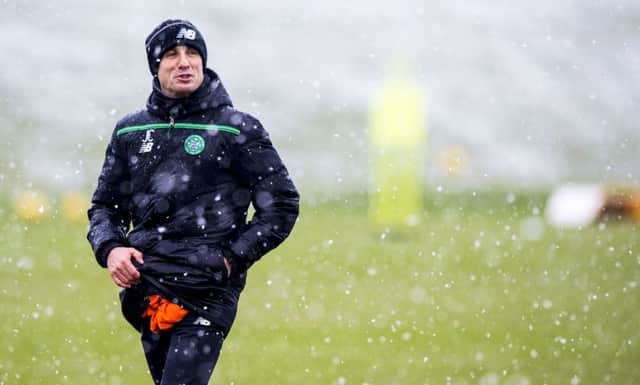 John Collins at snowy Lennoxtown, where he said Celtic had 23 first-team players in training. Picture: SNS