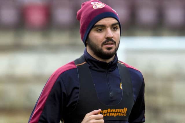 Hearts' Alim Ozturk is put through his paces at training. Picture: SNS