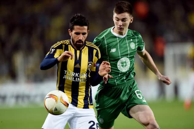 Kieran Tierney, right, was one of five Celtic players to be booked in the away match at Fenerbahce. Picture: Getty