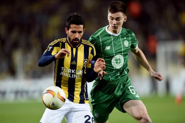 Kieran Tierney, right, was one of five Celtic players to be booked in the away match at Fenerbahce. Picture: Getty