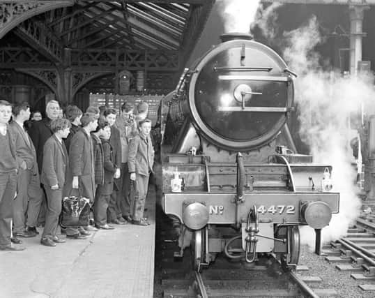 Trainspotters gather to see the Flying Scotsman at Waverley station, Edinburgh, in May 1964. Picture: TSPL