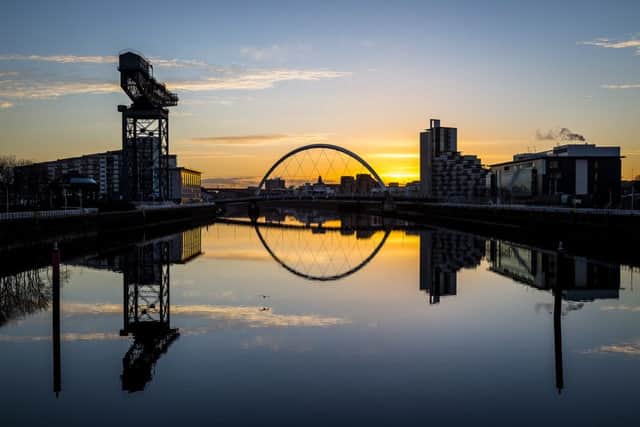 The sunrise over the Clyde Arc, known as the Squinty Bridge. Picture: Neil Barr