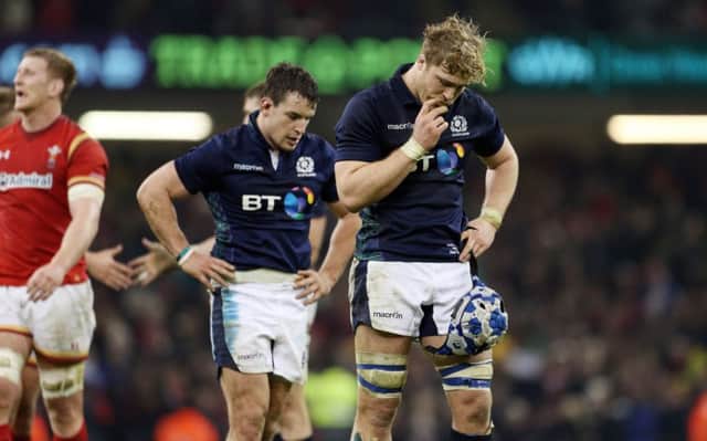 Dejection for Scotland's David Denton following the defeat by Wales. Picture: David Davies/PA