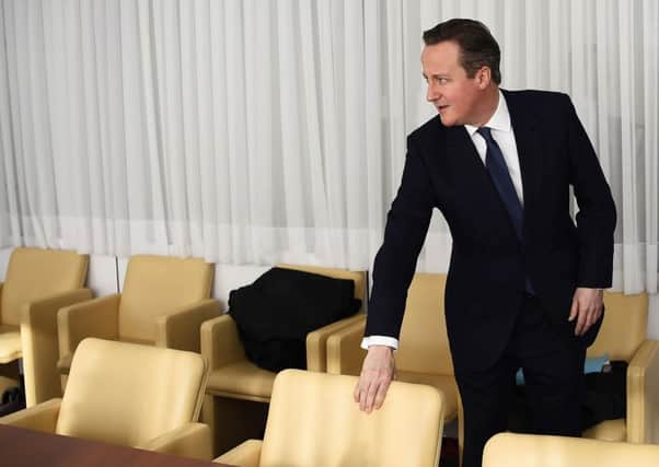David Cameron arrives for a meeting on the sidelines of an EU summit in Brussels. Picture: AP