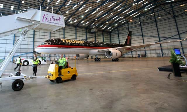 Trumps jet at Prestwick in 2014 for the official partnership unveiling. Picture: SWNS