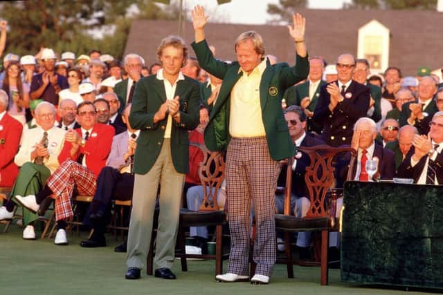 Jack Nicklaus receives the Green Jacket from previous winner Bernhard Langer after winning the 1986 Masters at the age of 46. Picture: David Cannon/Allsport