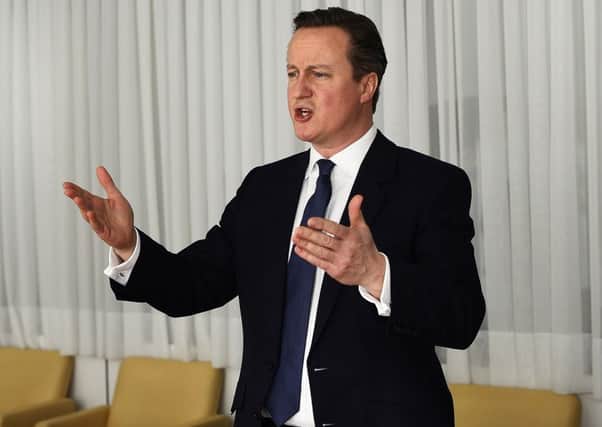 David Cameron speaks during a meeting on the sidelines of an EU summit in Brussels. Picture: AP