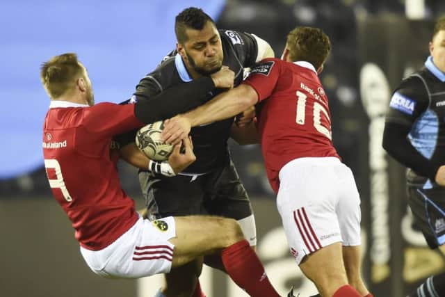 Glasgows Taqele Naiyaravoro tries to bulldoze his way past Munster pair Tomas OLeary, left, and Ian Keatley at Rugby Park. Picture: SNS Group