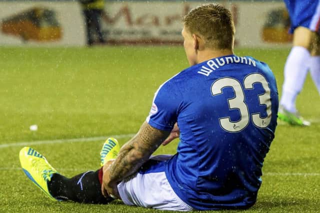 Rangers' Martyn Waghorn goes down with an injury at Rugby Park. Picture: SNS