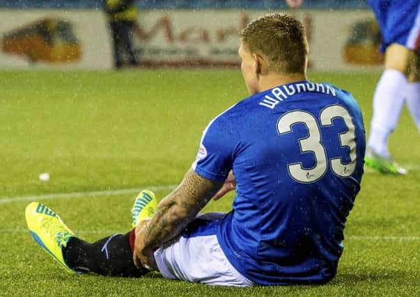Rangers' Martyn Waghorn goes down with an injury at Rugby Park. Picture: SNS