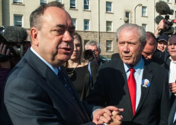 Jim Sillars with Alex Salmond on the campaign trail. Picture: Andrew O'Brien