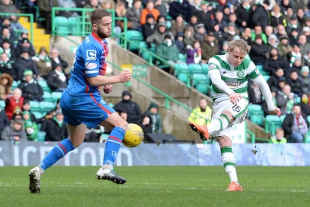 Gary Mackay-Steven (right) opens the scoring for Celtic. Picture: SNS
