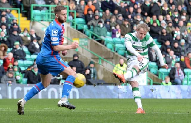 Gary Mackay-Steven (right) opens the scoring for Celtic. Picture: SNS