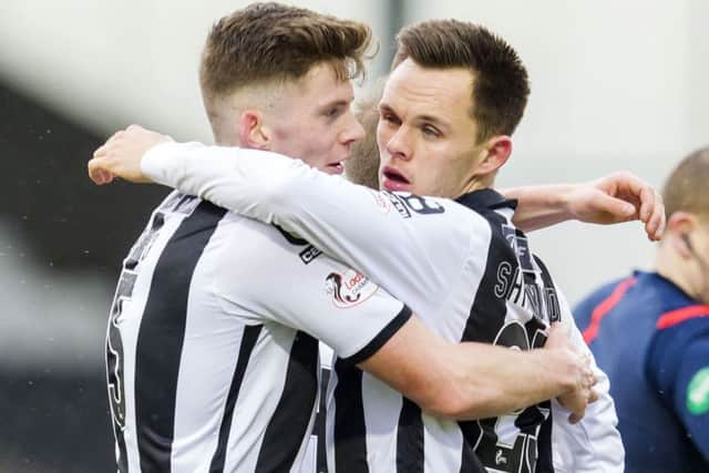 St Mirren scorer Lawrence Shankland, right, celebrates with Jack Baird. Picture: SNS