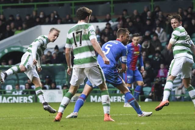 Leigh Griffiths scores Celtic's third goal. Picture: SNS