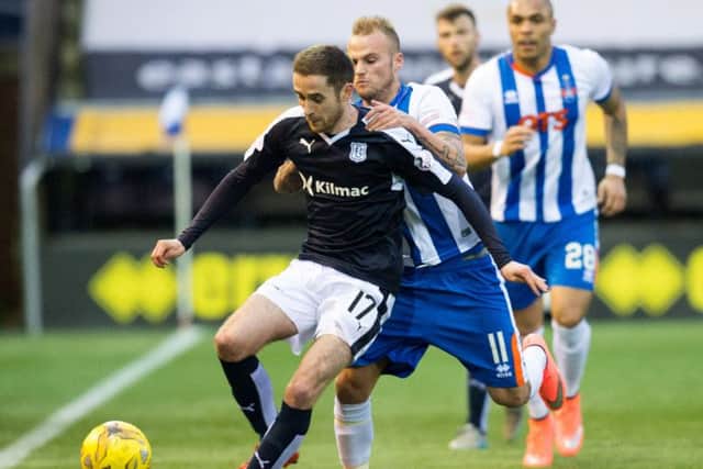 Dundee's Nick Ross holds off Kilmarnock's Kallum Higginbotham. Picture: SNS