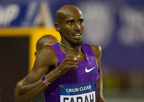 Mo Farah heads for victory in the 3000 metres final with a patient run. Picture: John Devlin