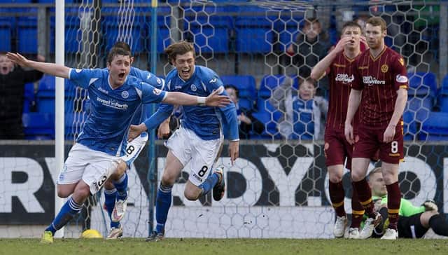 St Johnstone hero Tam Scobbie charges off to celebrate his late winner. Picture: SNS