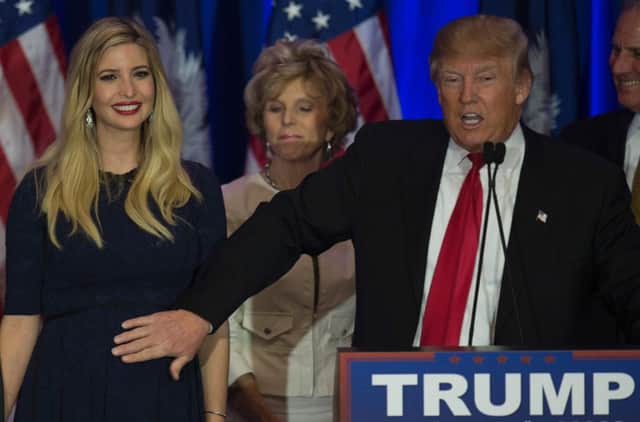 Donald Trump pats his pregnant daughter Ivanka. Picture: AFP/Getty