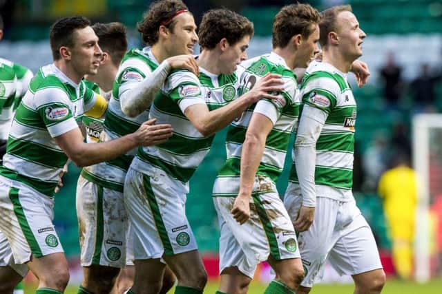 Celtic players rush to congratulate Leigh Griffiths. Picture: SNS