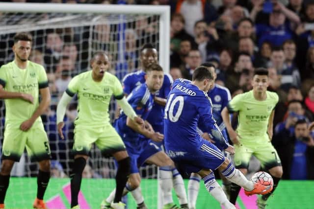 Chelseas Eden Hazard whips a free-kick into the net on the 67th-minute to make it 4-1 and put the game beyond Manchester City. Picture: AP