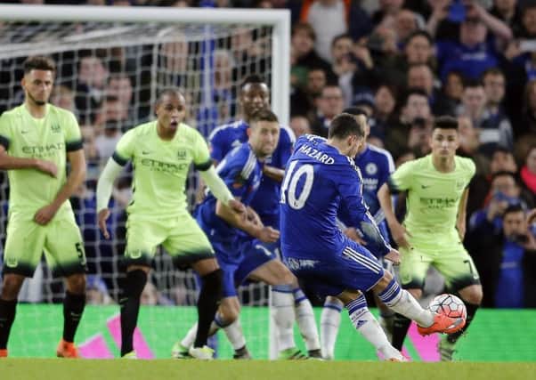 Chelseas Eden Hazard whips a free-kick into the net on the 67th-minute to make it 4-1 and put the game beyond Manchester City. Picture: AP