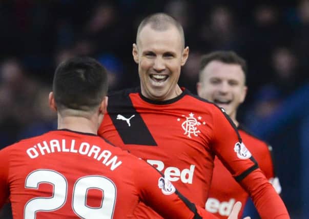 Kenny Miller celebrates after making it 1-0. Picture: SNS