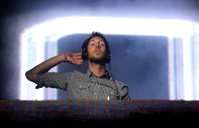 Calvin Harris performs at the King Tut's Wah Wah Tent during the 2011 T in the Park festival in Balado. The DJ began his career as a producer working from his parent's home in Dumfries. Picture: Jane Barlow/TSPL