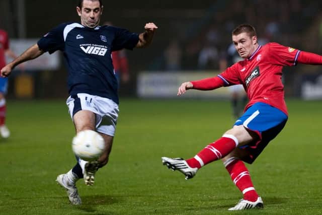 Harkins in action against Rangers back in 2009. Picture: SNS