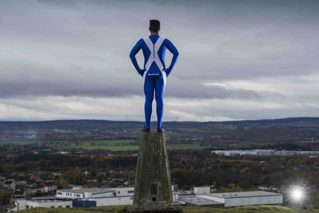 Josh Quigley istravelling around the world in 2016 visiting charities and other countries dressed in a saltire morphsuit and a kilt.
