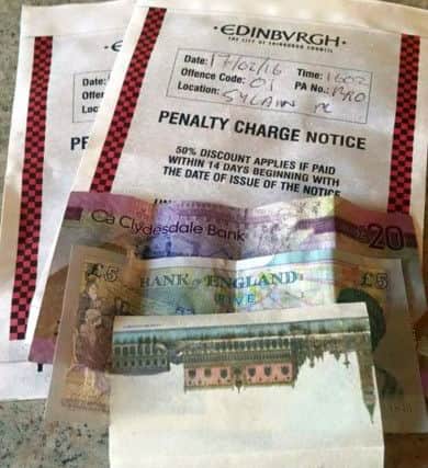 Mairi Holden's parking ticket and the money and note found underneath it. Picture: Sick Kids Hospital