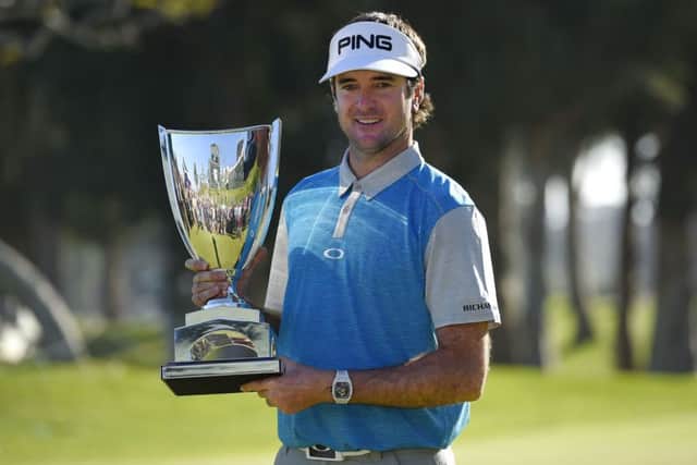 Bubba Watson holds his trophy after winning the Northern Trust Open golf tournament. Picture: AP