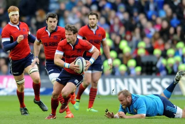 Peter Horne in action at Murrayfield against Italy last February. The Scots led 19-15 in the dying minutes but ended up losing 22-19. Picture: Jane Barlow