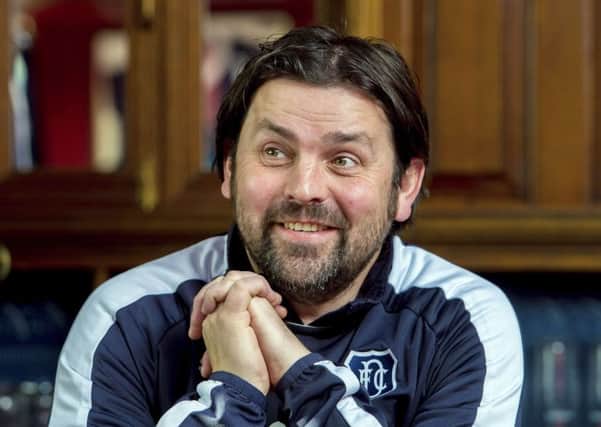 Manager Paul Hartley said he hadn't seen the comments made by his midfielder. Picture: SNS