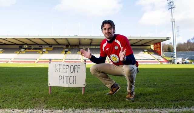 Partick Thistle defender Dan Seaborne beside the Firhill pitch, which has caused several call-offs for the Maryhill side this season. Picture: SNS