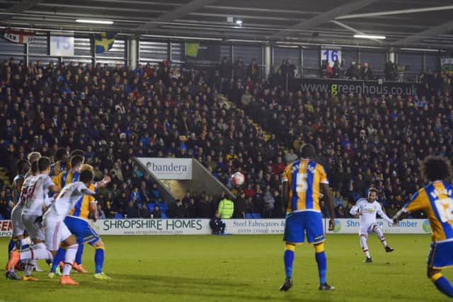 Juan Matas free kick is heading for the Shrewsbury net, putting Manchester United 2-0 ahead in their FA Cup clash last night. Picture: Getty