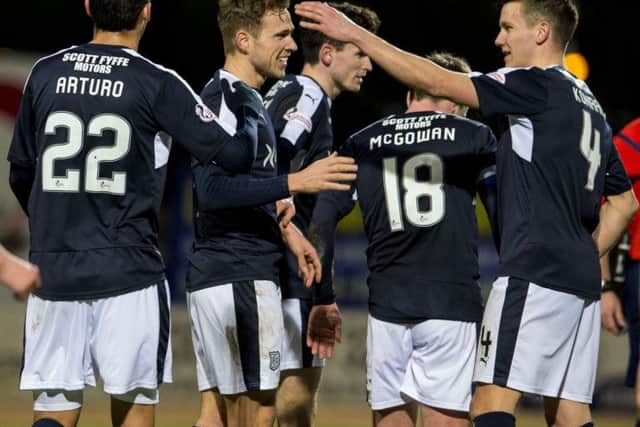 Dundee's Greg Stewart celebrates having scored a fifth for his side. Picture: SNS
