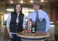 RSPB's Orkney corncrake officer Inga Seator and Norman Sinclaire from Orkney Brewery