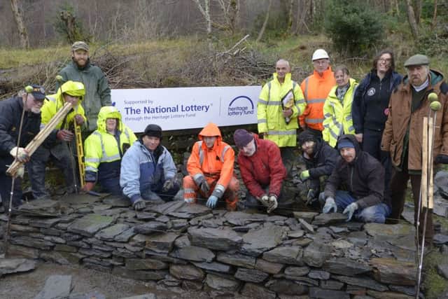 Trainees working on the plinth at the entrance to Ballachulish Quarry