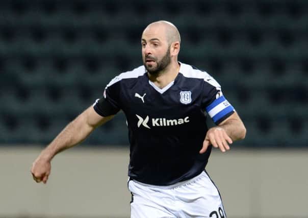Gary Harkins was instrumental in Dundee blowing away Dumbarton last night. Picture: SNS