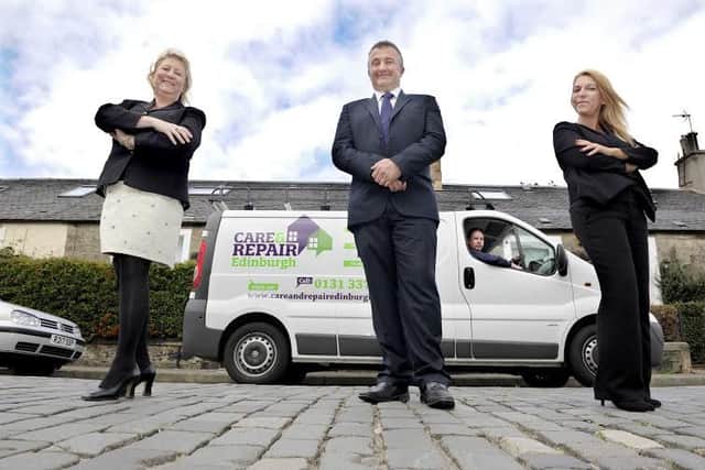 Care and Repair chief executive Graham Harper (centre) with (left to right)  volunteer officer Yvonne Georgeson , keysafe fitter  Andrew Finlayson (in van) and head of operations Louise Love.