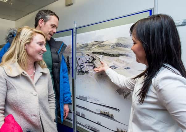 Suzanne Tighe from architect Keppie shows the film studio proposals to visitors at a public meeting. Picture: Ian Georgeson