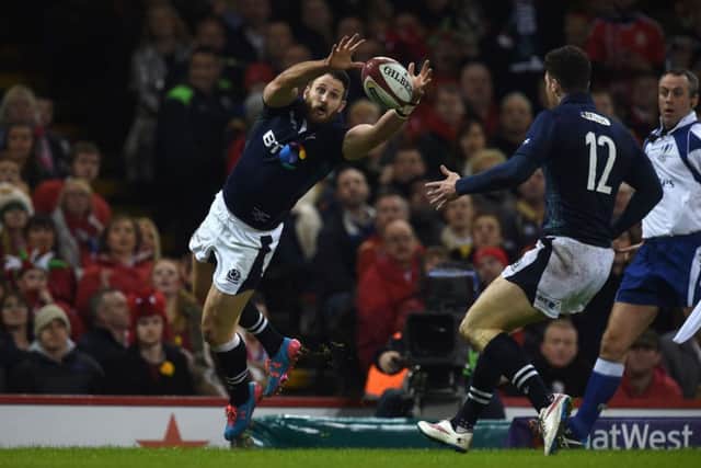 Tommy Seymour catches the ball to score Scotland's first try in the defeat by Wales in Cardiff. Picture: Paul Ellis/AFP/Getty Images